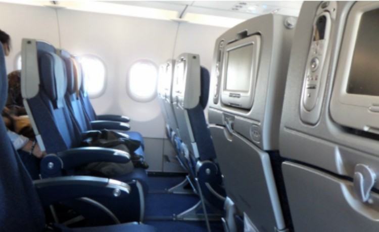 view of airplane cabin seats