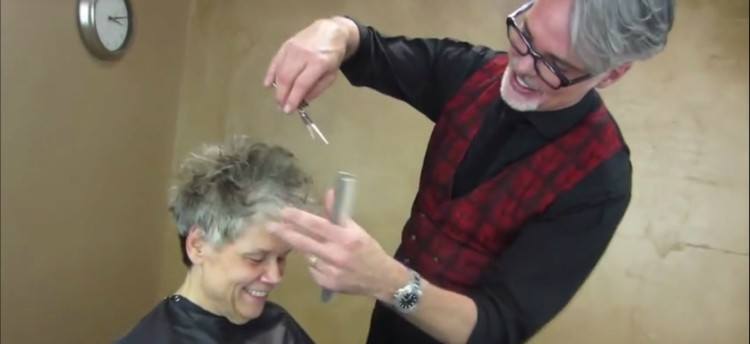 Image of woman getting a dry cut.