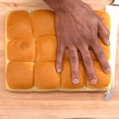 Philly Cheesesteak Sliders slicing dinner rolls in one piece
