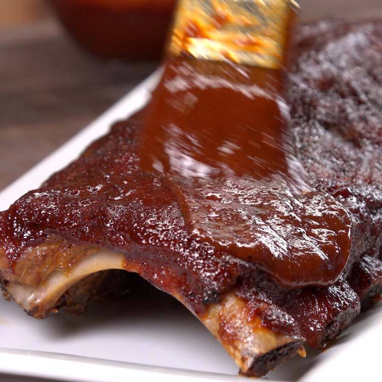 Baked BBQ Ribs saucing