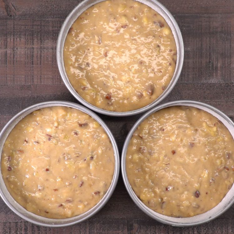 Hummingbird Cake batter in pans