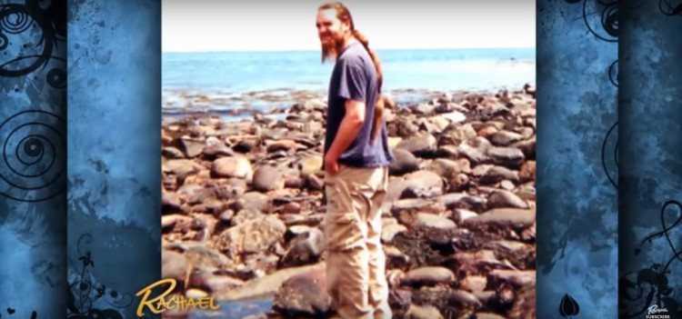 Image of man with long ponytail.
