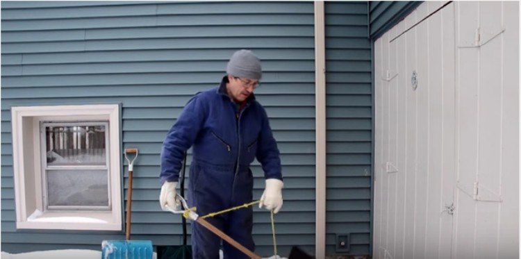Man showing off his rope shovel