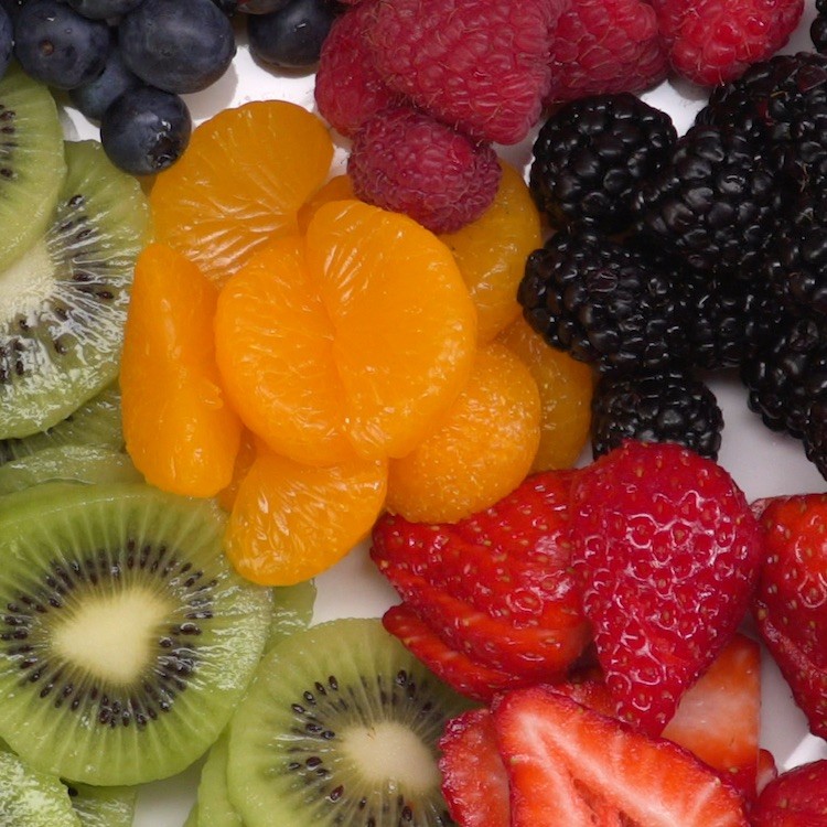 sugar cookie fruit tart cut kiwi strawberry mandarin orange blackberry raspberry blueberry
