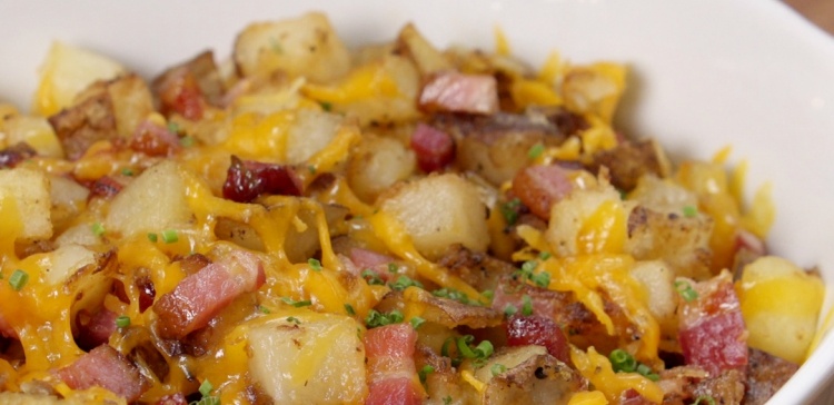 Close-up of bowl of loaded potato hash