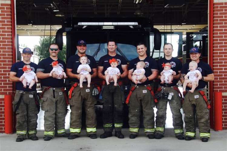 Pic of babies and dads at Glenpool fire station.