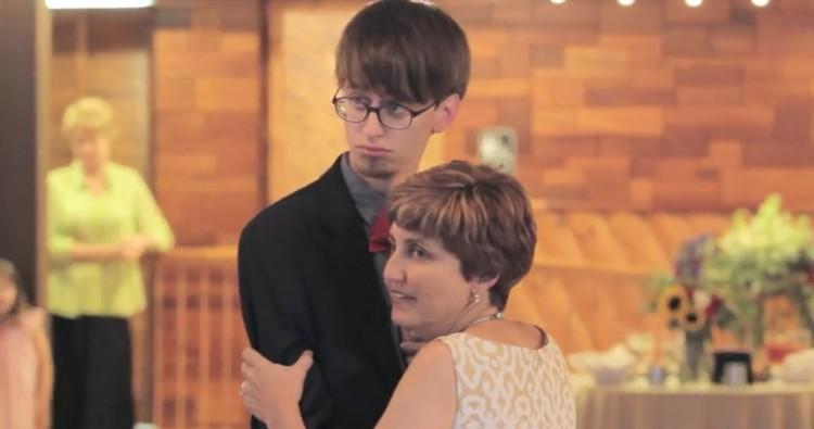 Mother and son wedding dance beginning.