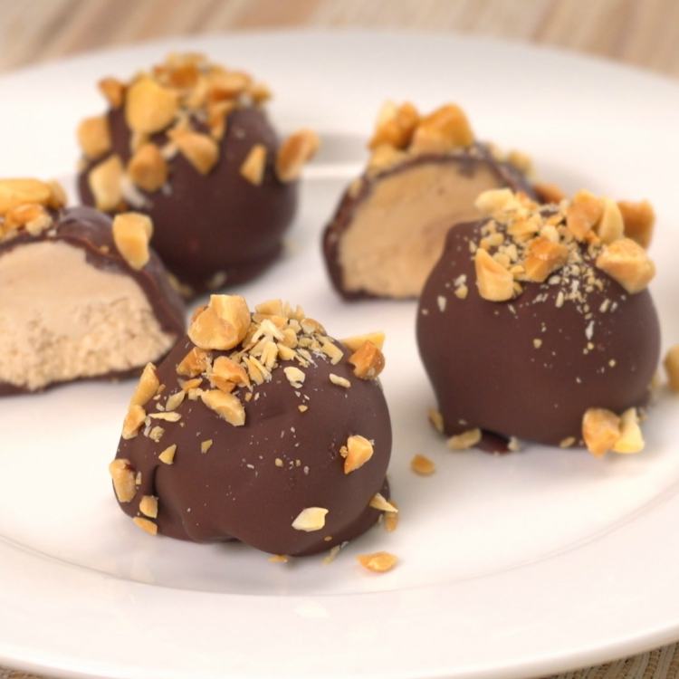 Chocolate-covered chopped-peanut-topped peanut butter cheesecake balls