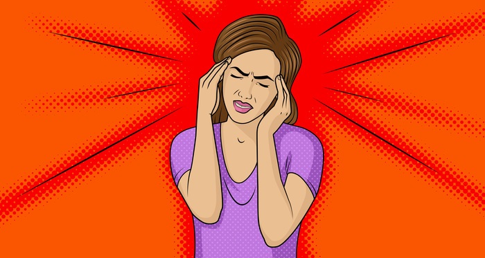 Woman with a headache.
