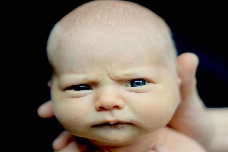 newborn scowl