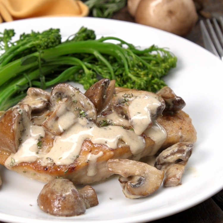 Rosemary portobello chicken on white plate