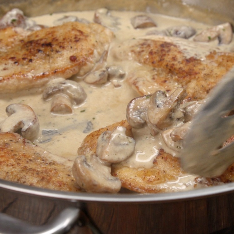 Cooking rosemary chicken and portobello mushrooms