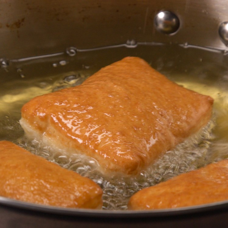 New Orleans Beignets frying