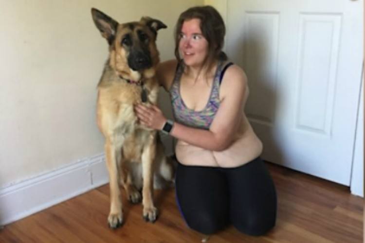 Image of teen and dog.