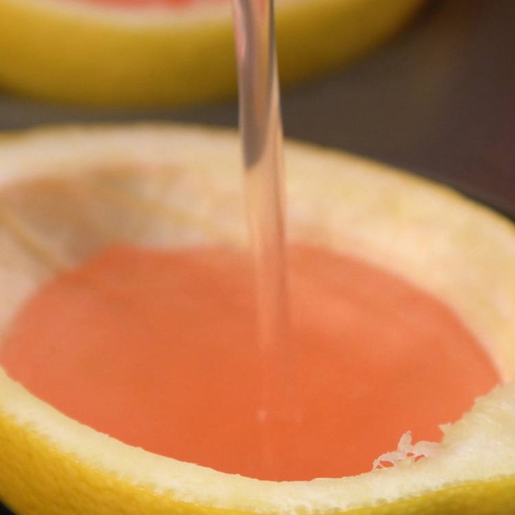 Fill each peel up to the top with pink lemonade Jell-O mixture
