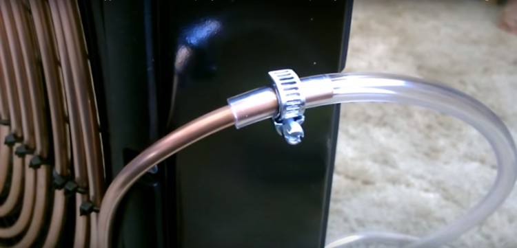 Connecting the plastic tube to the copper coil