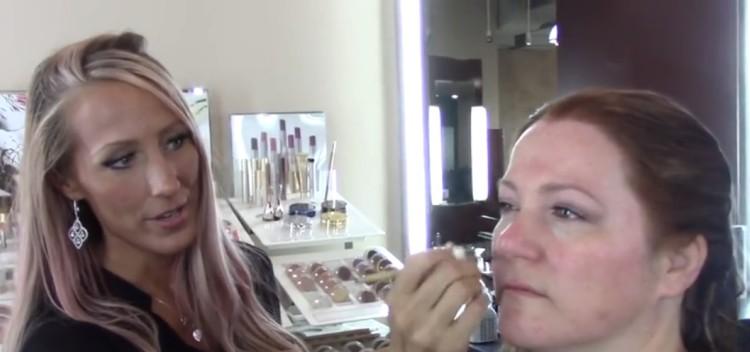 Christina getting her makeup done.