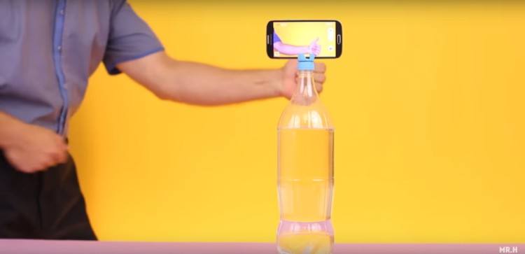 Plastic bottle caps as a phone stand.