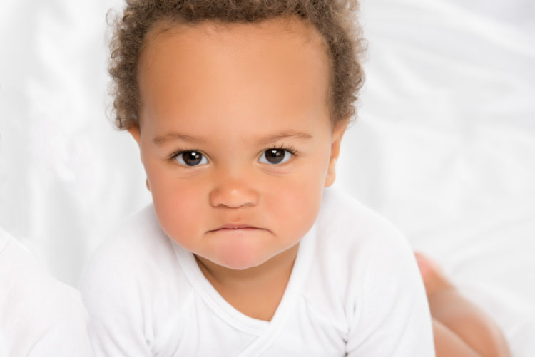 Image of baby boy frowning
