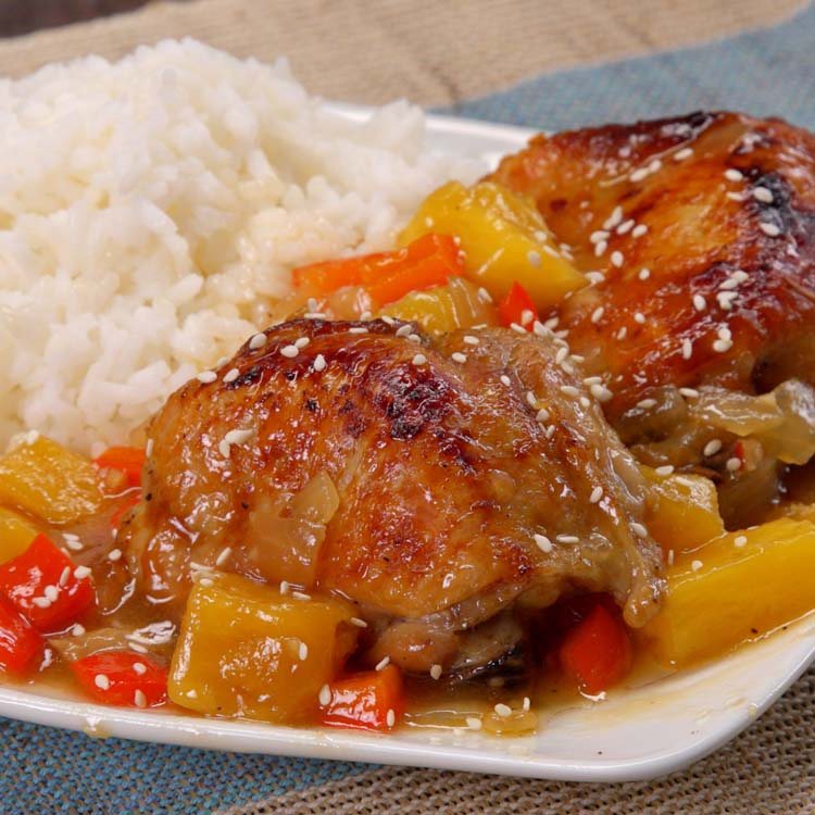 Slow Cooker Pineapple Chicken plated sesame seeds
