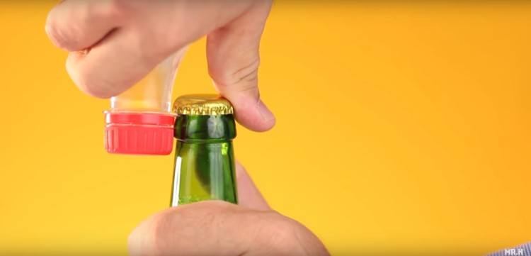 Using a plastc bottle for a beer bottle opener