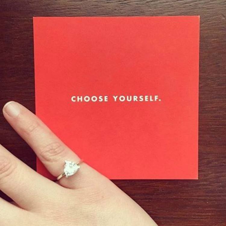 Image of pinky ring self-love.