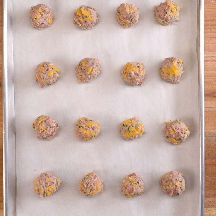 Our crowd-pleasing sausage balls recipe makes the easiest, tastiest, most addictive little party bites.
