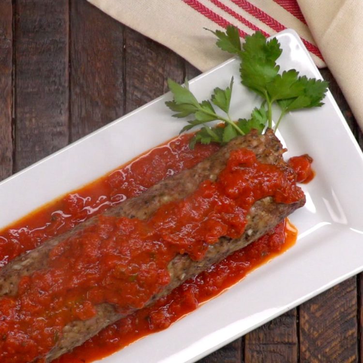 Pasta-Stuffed Meatloaf Roll marinara sauce parsley